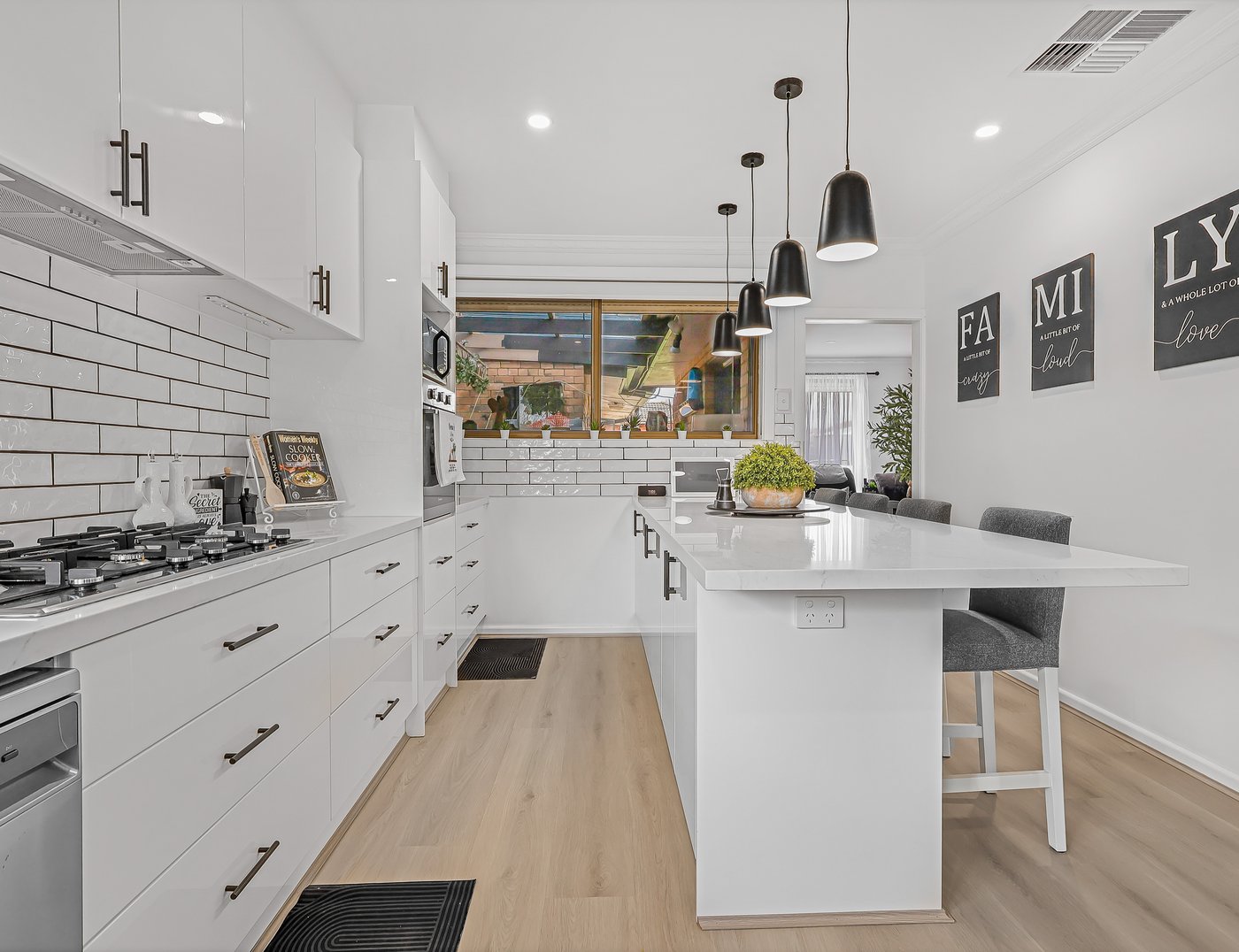 Final colour-graded edit of the same Melbourne family home kitchen