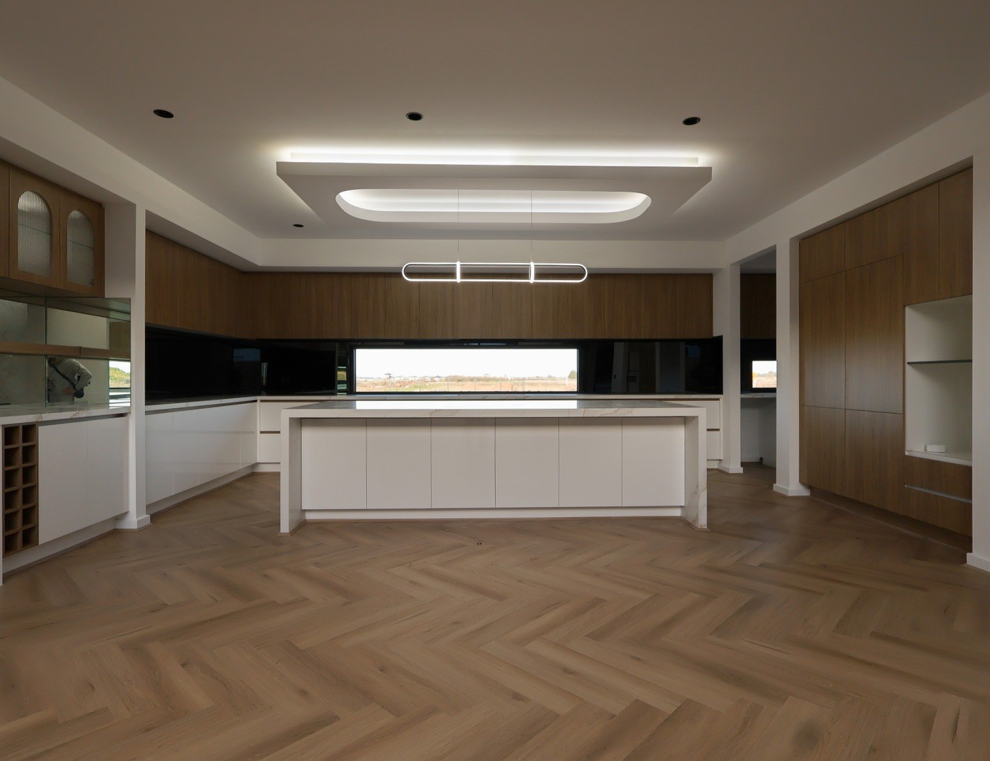 Unedited raw capture of a Melbourne home kitchen with herringbone flooring