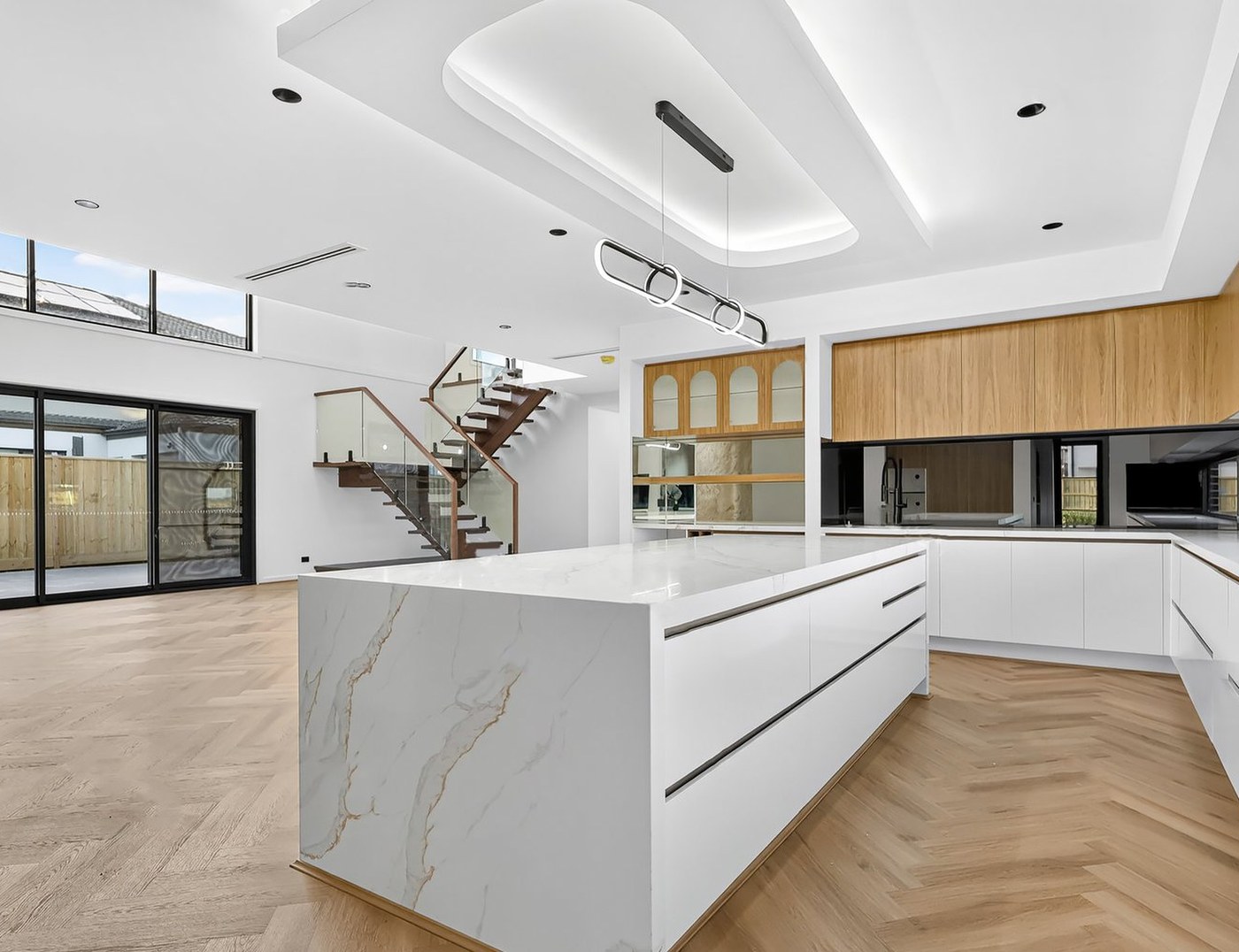 Final colour-graded edit of the same open-plan kitchen and living area