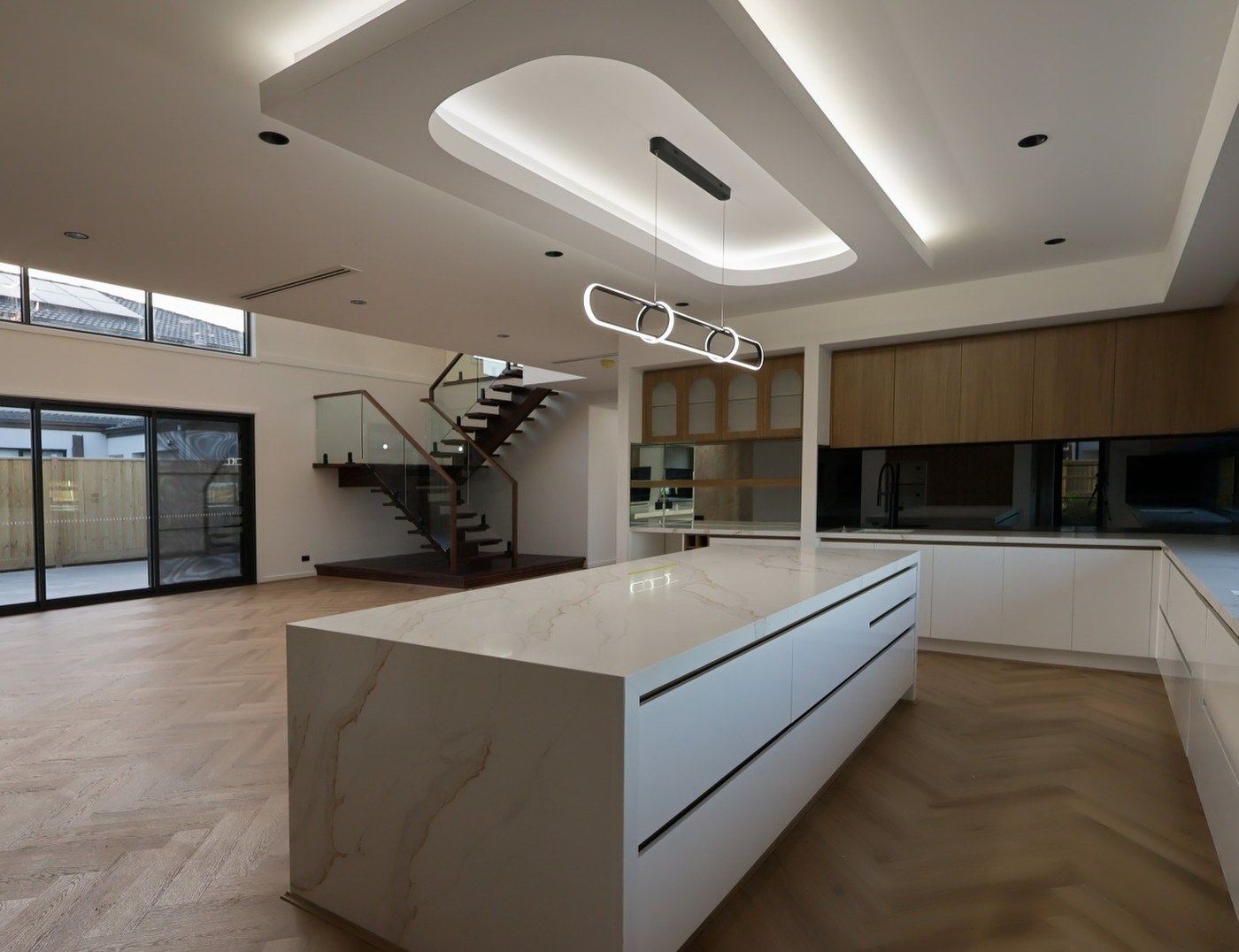 Unedited raw capture of an open-plan kitchen and living area in a Melbourne home
